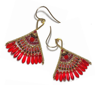 Pair of red beaded earrings on a white background