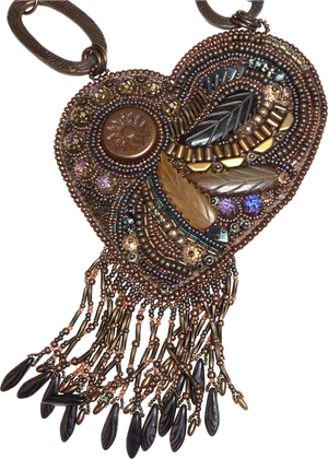 An ornate heart-shaped beaded pendant necklace with dangling bead fringe, featuring metallic bronze, gold, brown, and black beads, feather motifs, and iridescent accents.